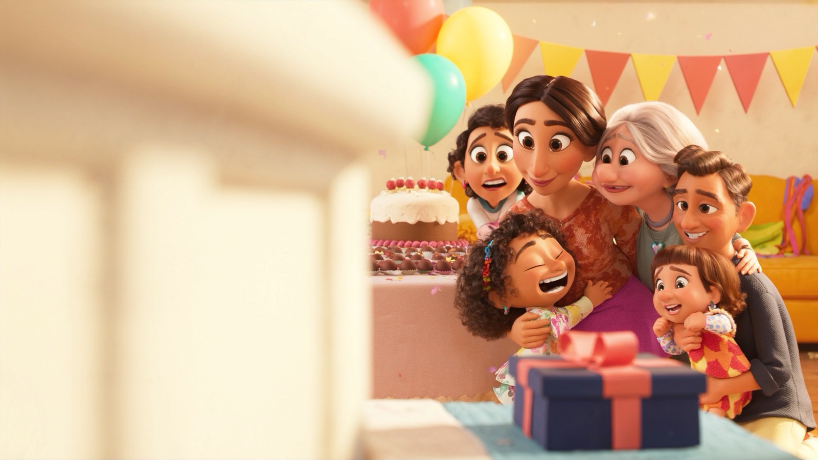 Ilustração 3D: família abraça a aniversariante na festa, com bolo, brigadeiros, balões e um presente com laço coral sobre a mesa.